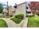 Condo exterior with desert landscaping, sidewalk, and address sign at 4391 Gannet Cir # 16, Las Vegas, NV 89103