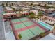 Aerial view showcasing community tennis courts, pool, and lush landscaping at 4421 Alexis Dr # 429, Las Vegas, NV 89103