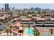 This aerial view highlights the pool, tennis courts and skyline views available to this condominium community at 4421 Alexis Dr # 429, Las Vegas, NV 89103
