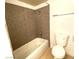 Bathroom displaying a shower-tub combo and a standard toilet at 4421 Alexis Dr # 429, Las Vegas, NV 89103