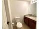Bathroom featuring a toilet, vanity, and granite countertops at 4421 Alexis Dr # 429, Las Vegas, NV 89103