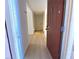 Entryway with a hallway, neutral colored walls, and hard surface floors at 4421 Alexis Dr # 429, Las Vegas, NV 89103