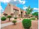 Well-maintained building exterior with desert landscaping and mature trees, offering curb appeal and charm at 4421 Alexis Dr # 429, Las Vegas, NV 89103