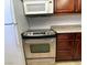 Kitchen view showcasing stainless steel oven, microwave, and refrigerator at 4421 Alexis Dr # 429, Las Vegas, NV 89103