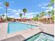 Inviting community pool and lounge area with ample seating and shade at 4421 Alexis Dr # 429, Las Vegas, NV 89103