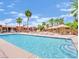Inviting community pool and hot tub with ample lounge seating and lush landscaping perfect for relaxing at 4421 Alexis Dr # 429, Las Vegas, NV 89103