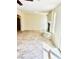 Bright and airy living room with tile floors and a cozy fireplace at 4726 Castle Rock Ct, Las Vegas, NV 89147