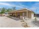 Large backyard with a covered patio and ample space for outdoor activities at 4739 Glenndavis Dr, Las Vegas, NV 89121