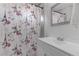 Bathroom showcasing shower/tub combination with Paris-themed shower curtain and white sink at 4739 Glenndavis Dr, Las Vegas, NV 89121