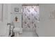 Bright bathroom featuring a toilet, vanity, and a Paris-themed shower curtain at 4739 Glenndavis Dr, Las Vegas, NV 89121