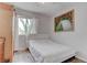 Bright bedroom with a comfortable bed and natural light streaming through the window at 4739 Glenndavis Dr, Las Vegas, NV 89121