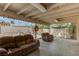 Cozy covered patio space with comfortable seating and decorative string lights at 4739 Glenndavis Dr, Las Vegas, NV 89121