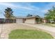 Charming single-story home with a driveway, a one-car garage and desert landscaping at 4739 Glenndavis Dr, Las Vegas, NV 89121