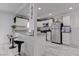 Open kitchen with granite countertops, stainless steel appliances, and bar seating for casual dining at 4739 Glenndavis Dr, Las Vegas, NV 89121