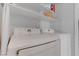Convenient laundry room features modern Samsung washer and dryer, with extra shelving at 4739 Glenndavis Dr, Las Vegas, NV 89121