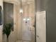 Inviting entrance area with neutral tones, featuring a white door and simple decor, providing a welcoming ambiance at 4833 Lawnwood Ct, Las Vegas, NV 89130