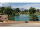 Picturesque pond surrounded by lush greenery, offering a serene and scenic view for residents to enjoy at 4833 Lawnwood Ct, Las Vegas, NV 89130