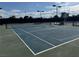 Well maintained tennis court for active residents to play tennis outdoors in the sunshine at 4833 Lawnwood Ct, Las Vegas, NV 89130