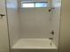 This is a bathroom shower with a tiled wall at 5030 Salinaz Cir, Las Vegas, NV 89118