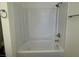 Clean, well-maintained bathtub and shower combination, featuring modern fixtures at 5030 Salinaz Cir, Las Vegas, NV 89118