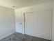 Bedroom featuring a sliding door closet and an additional closet for extra storage at 5030 Salinaz Cir, Las Vegas, NV 89118