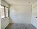 This is a bedroom with a window and grey carpet flooring at 5030 Salinaz Cir, Las Vegas, NV 89118
