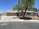 Charming single-story home featuring a brick accent and two-car garage at 5030 Salinaz Cir, Las Vegas, NV 89118