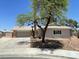Charming single-story home featuring a brick accent and two-car garage at 5030 Salinaz Cir, Las Vegas, NV 89118