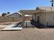 A covered patio features wood decking and a spacious design at 5030 Salinaz Cir, Las Vegas, NV 89118