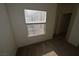 Bedroom featuring neutral walls, carpet flooring, and a window at 5125 W Reno Ave # 1059, Las Vegas, NV 89118