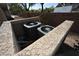 Exterior shot of two AC units surrounded by decorative brick and landscaping at 5125 W Reno Ave # 1059, Las Vegas, NV 89118