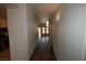 Inviting hallway leading into an open concept living space with lovely hard wood floors at 5125 W Reno Ave # 1059, Las Vegas, NV 89118