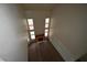 Spacious living room with a cozy fireplace, hardwood floors, and many windows at 5125 W Reno Ave # 1059, Las Vegas, NV 89118