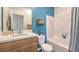Stylish bathroom with a single vanity, neutral accents, and a shower and tub at 551 Ruby Robin Ave # Lot 750, Henderson, NV 89011