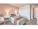 Serene bedroom design with soft colors, floral accents, and a comfortable bed for a peaceful retreat at 551 Ruby Robin Ave # Lot 750, Henderson, NV 89011
