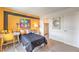 Stylish bedroom showcasing a playful PacMan theme with modern furniture and a cozy, inviting atmosphere at 551 Ruby Robin Ave # Lot 750, Henderson, NV 89011