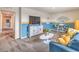 Spacious living room with a modern TV console, comfortable seating, and stylish decor at 551 Ruby Robin Ave # Lot 750, Henderson, NV 89011