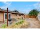 Backyard patio with sliding glass door, grill and shed at 5900 Fawn Ave, Las Vegas, NV 89107