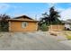 Front view of single-story home with low maintenance landscaping and decorative block fence at 5900 Fawn Ave, Las Vegas, NV 89107
