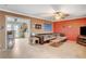 Living room featuring an open floor plan, ceiling fan, and access to kitchen area at 5900 Fawn Ave, Las Vegas, NV 89107