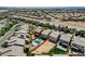 A high angle aerial view showing the vacant lot within the context of the residential neighborhood at 5947 Wellington Peak Rd, Las Vegas, NV 89148
