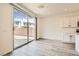 Bright living room with wood floors, sliding glass doors and backyard access at 5947 Wellington Peak Rd, Las Vegas, NV 89148