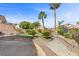 Large brick-paved backyard, showcasing its mature landscaping at 644 Wind Cave Ct, Henderson, NV 89012