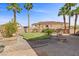 Beautiful backyard with mature landscaping and brick patio at 644 Wind Cave Ct, Henderson, NV 89012
