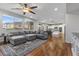 Open-concept design showcasing the living room with seamless transition to kitchen at 644 Wind Cave Ct, Henderson, NV 89012