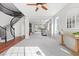 Spacious living room with a spiral staircase and plenty of natural light at 644 Wind Cave Ct, Henderson, NV 89012