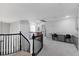 Bright and airy loft space with a spiral staircase and built-in desk area at 644 Wind Cave Ct, Henderson, NV 89012