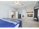 This spacious main bedroom features a fireplace, neutral colors, and lots of space at 644 Wind Cave Ct, Henderson, NV 89012