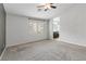Neutral Primary bedroom featuring vaulted ceiling and an en-suite bathroom at 7345 Chesapeake Cove St, Las Vegas, NV 89166