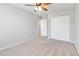 Carpeted bedroom with neutral walls, and closet at 7345 Chesapeake Cove St, Las Vegas, NV 89166
